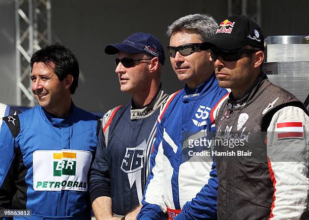 Michael Goulian of USA, Alejandro Maclean of Spain, Paul Bonhomme of Great Britain and Hannes Arch of Austria pose for the media during the Red Bull...