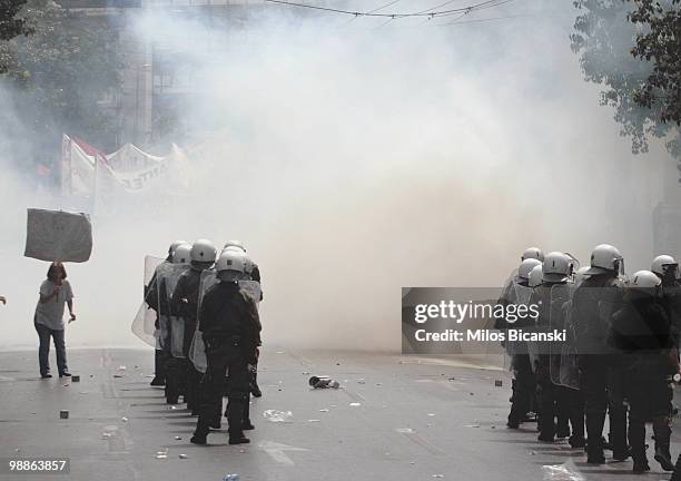 Greek riot police clash with protesters on May 5, 2010 in Athens, Greece. Three people have died after protesters set fire to the Marfin Egnatia Bank...