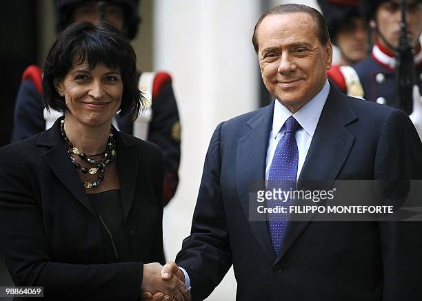 Italian Prime Minister Silvio Berlusconi greets President of the Swiss Confederation President Doris Leuthard during their meeting on May 5, 2010 at...