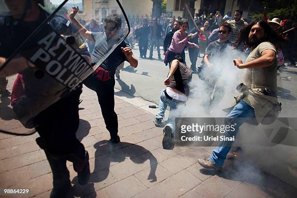 Greek police clash with demonstrators in front of a government building on May 5, 2010 in Mytilene, Greece. Three people have died after protesters...