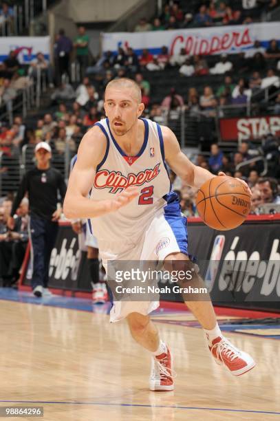 Steve Blake of the Los Angeles Clippers drives to the basket against the Milwaukeee Bucks at Staples Center on March 17, 2010 in Los Angeles,...