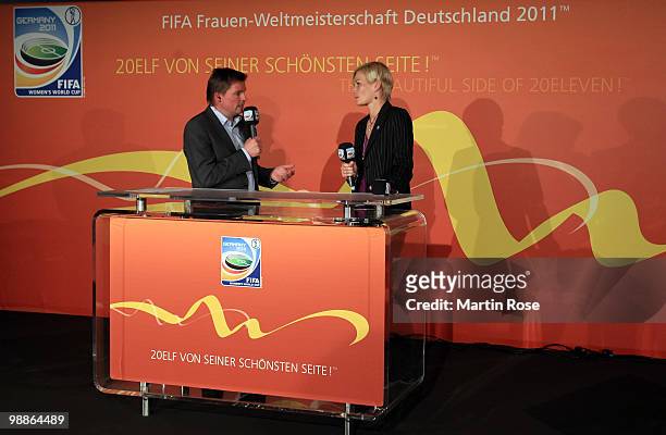 Jens Grittner talks to referee Bibiana Steinhaus during the FIFA Women's World Cup 2011 Countdown event at the Volkswagen Arena on May 5, 2010 in...