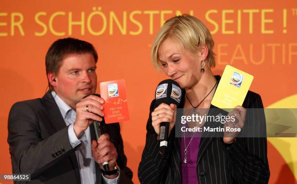 Jens Grittner talks to referee Bibiana Steinhaus during the FIFA Women's World Cup 2011 Countdown event at the Volkswagen Arena on May 5, 2010 in...
