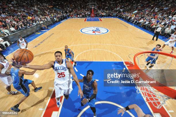 Rodney Carney of the Philadelphia 76ers puts a shot up against Jodie Meeks of the Orlando Magic during the game on March 22, 2010 at the Wachovia...