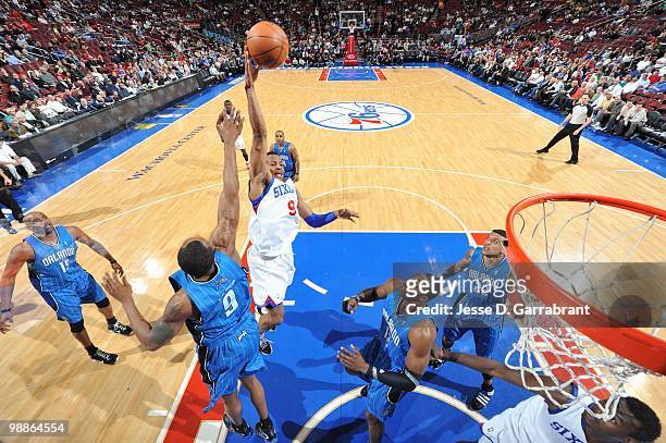 Andre Iguodala of the Philadelphia 76ers puts a shot up against Rashard Lewis of the Orlando Magic during the game on March 22, 2010 at the Wachovia...