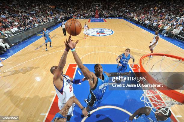 Dwight Howard of the Orlando Magic puts a shot up against Marreese Speights of the Philadelphia 76ers during the game on March 22, 2010 at the...