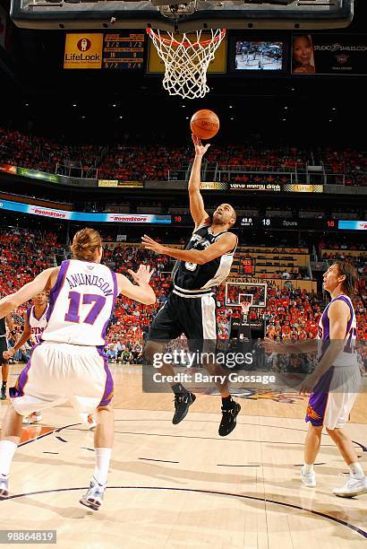 Tony Parker of the San Antonio Spurs puts a shot up over Louis Amundson of the Phoenix Suns in Game One of the Western Conference Semifinals during...