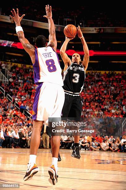 George Hill of the San Antonio Spurs shoots over Channing Frye of the Phoenix Suns in Game One of the Western Conference Semifinals during the 2010...