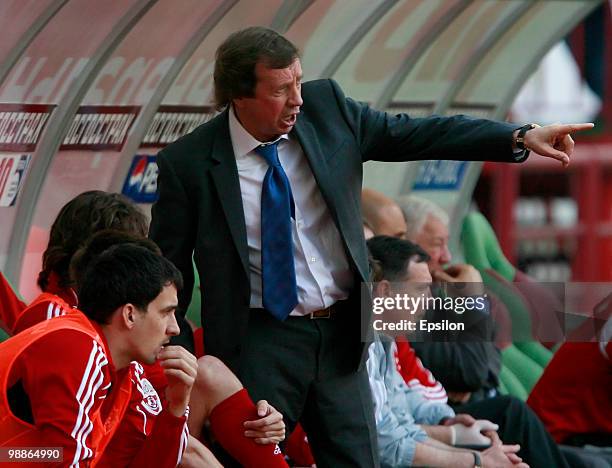 Head coach Yuri Syomin of FC Lokomotiv Moscow gestures during the Russian Football League Championship match between FC Lokomotiv Moscow and FC...