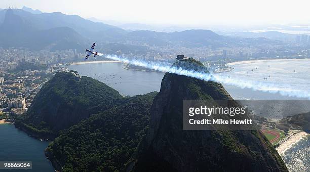 Paul Bonhomme of Great Britain in action over Sugar Loaf Mountain during the Red Bull Air Race Day -4 at on May 5, 2010 in Rio de Janeiro, Brazil.
