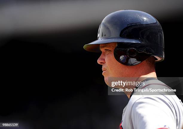 Chipper Jones of the Atlanta Braves looks on against the New York Mets on April 24, 2010 at Citi Field in the Flushing neighborhood of the Queens...