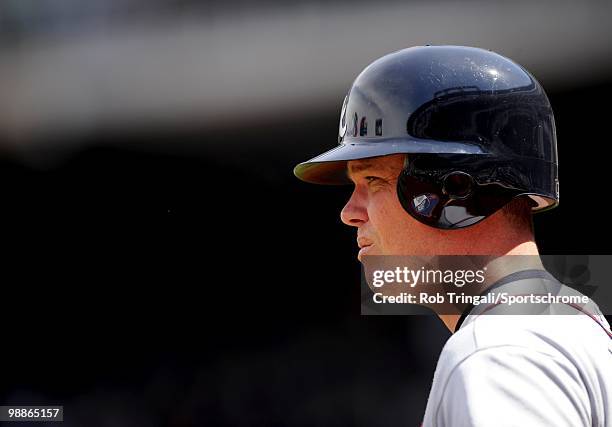 Chipper Jones of the Atlanta Braves looks on against the New York Mets on April 24, 2010 at Citi Field in the Flushing neighborhood of the Queens...