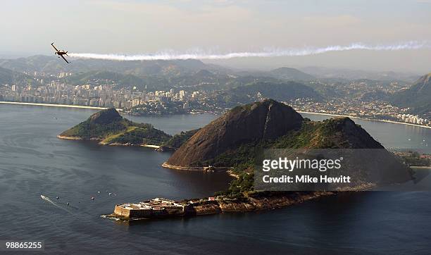 Nigel Lamb of Great Britain in action over Sugar Loaf Mountain during the Red Bull Air Race Day -4 at on May 5, 2010 in Rio de Janeiro, Brazil.