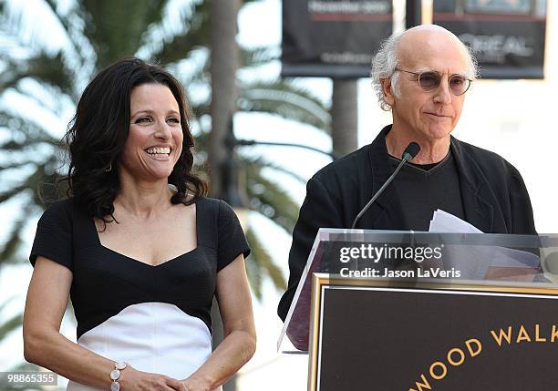 Julia Louis-Dreyfus and Larry David attend Julia Louis-Dreyfus' induction into the Hollywood Walk of Fame on May 4, 2010 in Hollywood, California.