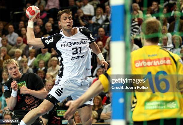 Momir Ilic of Kiel scores during the Toyota Handball Bundesliga match between THW Kiel and HSG Duesseldorf at the Sparkassen Arena on May 5, 2010 in...