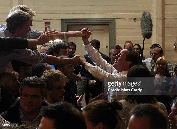 Conservative Party leader David Cameron greets supporters at a party rally at the end of his 24hr campaign stint on May 5, 2010 in Bristol, United...