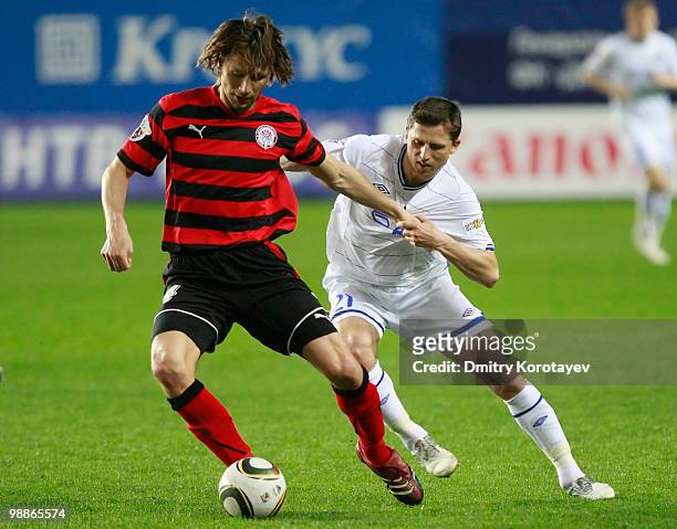 Igor Semshov of FC Dynamo Moscow battles for the ball with Vitaliy Fedoriv of FC Amkar Perm during the Russian Football League Championship match...