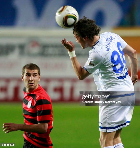 Edgaras Cesnauskis of FC Dynamo Moscow battles for the ball with Vitaliy Fedoriv of FC Amkar Perm during the Russian Football League Championship...