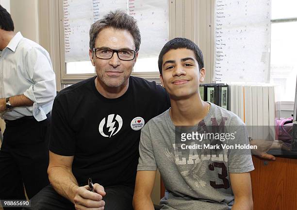 Actor and The Creative Coalition Co-President Tim Daly and High School student, Cody Medina, Age 16 attend hands-on learning during National Lab Day...