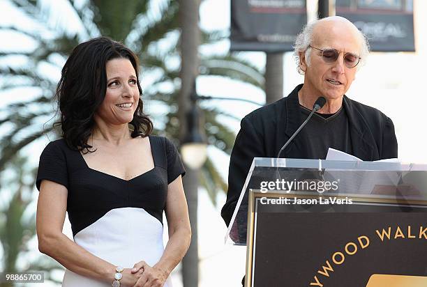 Julia Louis-Dreyfus and Larry David attend Julia Louis-Dreyfus' induction into the Hollywood Walk of Fame on May 4, 2010 in Hollywood, California.