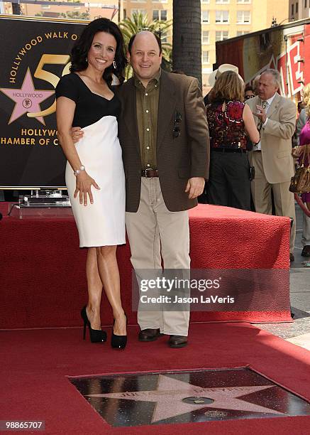 Julia Louis-Dreyfus and Jason Alexander attend Julia Louis-Dreyfus' induction into the Hollywood Walk of Fame on May 4, 2010 in Hollywood, California.