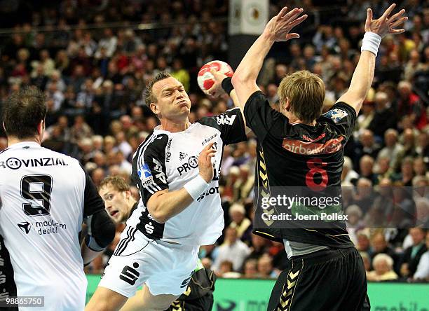 Christian Zeitz of Kiel scores during the Toyota Handball Bundesliga match between THW Kiel and HSG Duesseldorf at the Sparkassen Arena on May 5,...