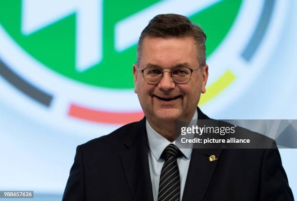 President Reinhard Grindel poses at the extraordinary federal conference of the German Football Association in Frankfurt/Main, Germany, 8 December...