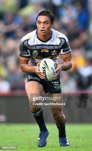 Enari Tuala of the Cowboys runs the ball during the round 16 NRL match between the South Sydney Rabbitohs and the North Queensland Cowboys at Barlow...