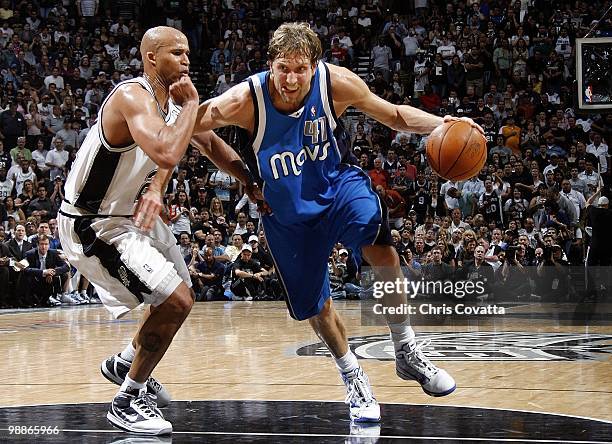 Dirk Nowitzki of the Dallas Mavericks drives to the basket against Richard Jefferson of the San Antonio Spurs in Game Four of the Western Conference...