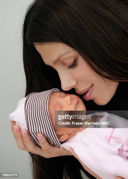 Oksana Grigorieva poses with her daughter Lucia during a photo shoot on November 2, 2009 in Los Angeles, California.