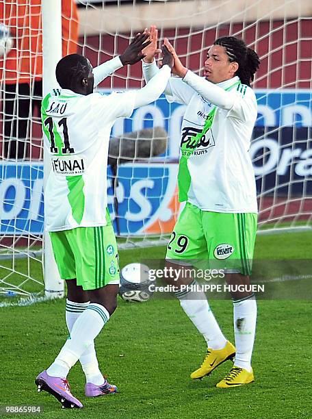 Saint-Etienne's forward Emmanuel Riviere celebrates after scoring a goal during the French L1 football match Boulogne-sur-Mer vs Saint-Etienne on May...