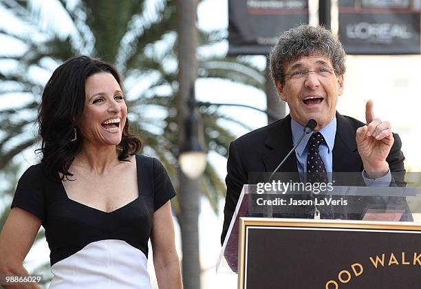 Julia Louis-Dreyfus and Alan Horn attend Julia Louis-Dreyfus' induction into the Hollywood Walk of Fame on May 4, 2010 in Hollywood, California.