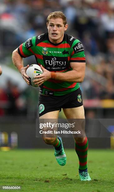 Tom Burgess of the Rabbitohs runs the ball during the round 16 NRL match between the South Sydney Rabbitohs and the North Queensland Cowboys at...