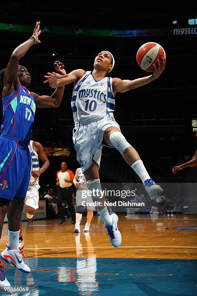 Lindsey Harding of the Washington Mystics shoots against Essence Carson of the New York Liberty at the Verizon Center on May 5, 2010 in Washington,...