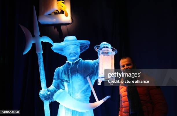 During a press tour of the new Eiswelt at Karls Erlebnis-Dorf, manager Robert Dahl stands next to a night watchman, who is about to be hit by waste...