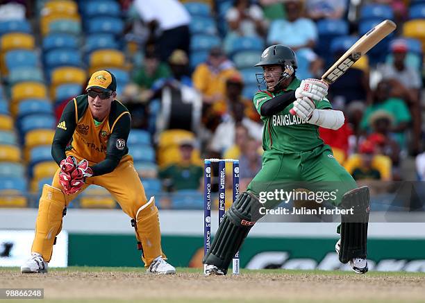 Mushfiqur Rahim of Bangladesh scores runs as Brad Haddin looks on during The ICC World Twenty20 Group A Match between Bangladesh and Australia played...