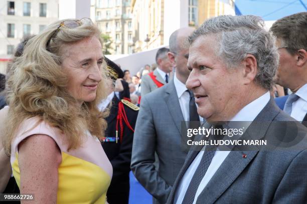 French Justice Minister Nicole Belloubet and the son of late French politician and Holocaust survivor Simone Veil, Jean Veil, talk as they arrive to...