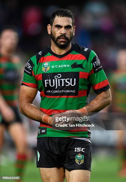 Greg Inglis of the Rabbitohs holds his hand after being injured during the round 16 NRL match between the South Sydney Rabbitohs and the North...