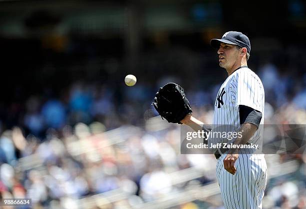 Andy Pettitte of the New York Yankees gets the ball back against the Baltimore Orioles at Yankee Stadium on May 5, 2010 in the Bronx borough of New...