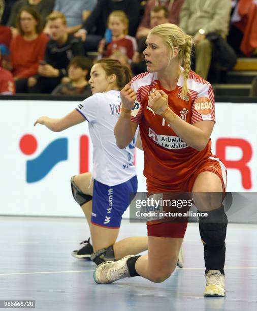 Denmark's Kathrine Heindahl celebrates after a goal during the Women's Handball World Championship match between Denmark and Russia at the EWE Arena...