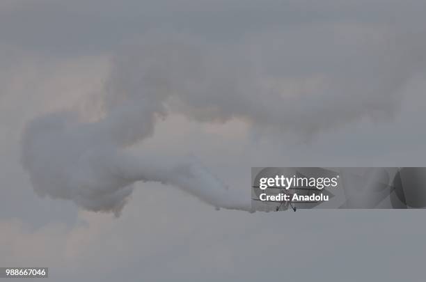 Semin Ozturk, Turkey's first professional female aerobatic pilot performs a demonstration flight with her 'Pitts S2-B' plane that has Lycoming engine...