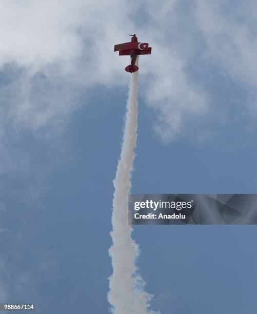Semin Ozturk, Turkey's first professional female aerobatic pilot performs a demonstration flight with her 'Pitts S2-B' plane that has Lycoming engine...