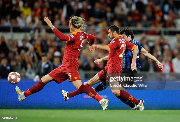 Diego Milito scores the first goal during the Tim Cup between FC Internazionale Milano and AS Roma at Stadio Olimpico on May 5, 2010 in Rome, Italy.