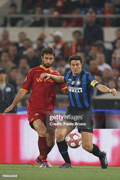 Javier Zanetti of FC Internazionale Milano and Mirko Vucinic of AS Roma in action during the Tim Cup between FC Internazionale Milano and AS Roma at...