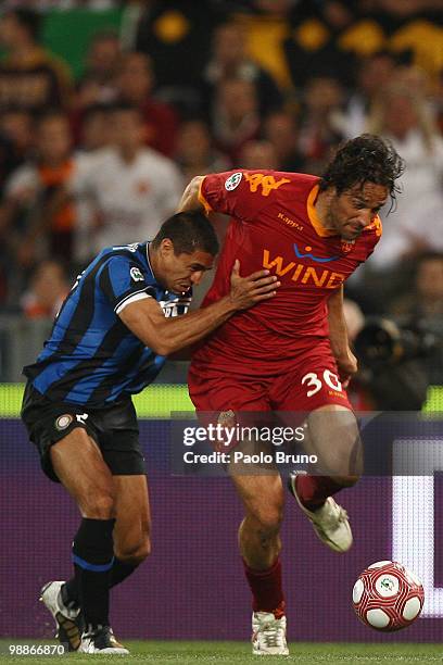 Ivan Cordoba of FC Internazionale Milano and Luca Toni of AS Roma in action during the Tim Cup between FC Internazionale Milano and AS Roma at Stadio...