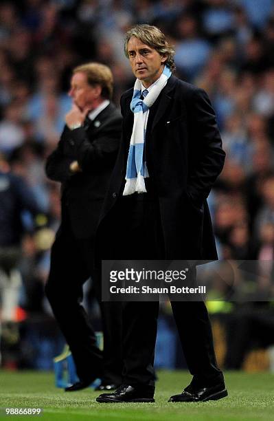 Manchester City Manager Roberto Mancini looks on during the Barclays Premier League match between Manchester City and Tottenham Hotspur at the City...