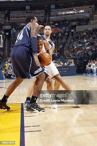 Russell Westbrook of the Oklahoma City Thunder drives the ball against Paul Millsap of the Utah Jazz on March 14, 2010 at the Ford Center in Oklahoma...