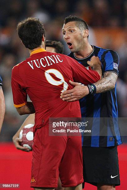 Marco Materazzi of FC Internazionale Milano talks with Mirko Vucinic of AS Roma during the Tim Cup between FC Internazionale Milano and AS Roma at...