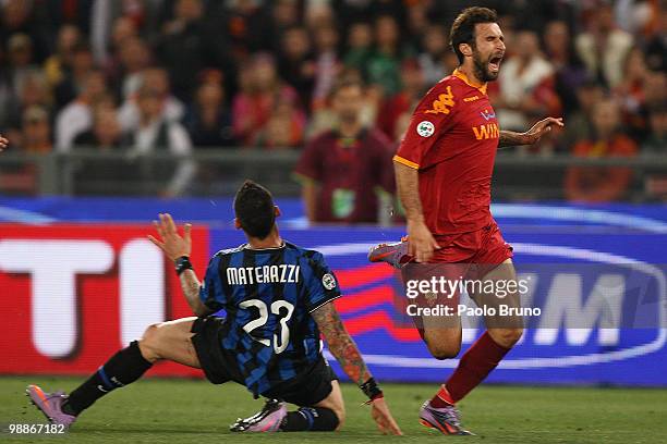 Marco Materazzi of FC Internazionale Milano with Mirko Vucinic of AS Roma compete for the ball during the Tim Cup between FC Internazionale Milano...