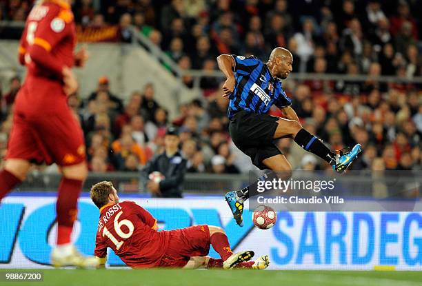 Daniele De Rossii of AS Roma competes for the ball with Maicon of FC Internazionale Milano during the Tim Cup between FC Internazionale Milano and AS...